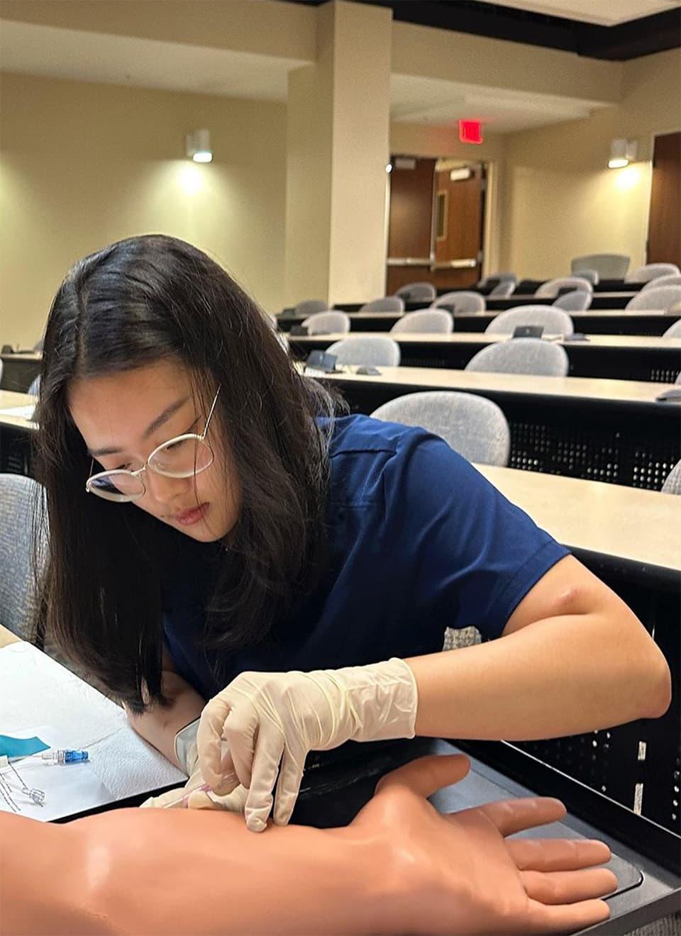 student learning nursing skills